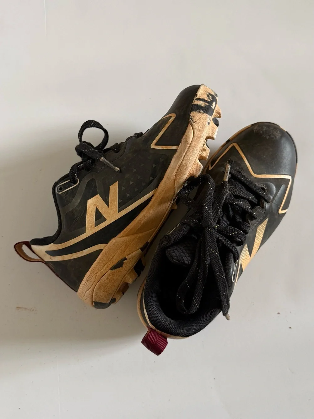 New Balance Black and white Romero Cleats